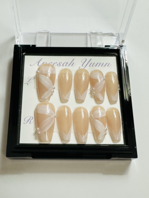 nude with flower pedals and pearls